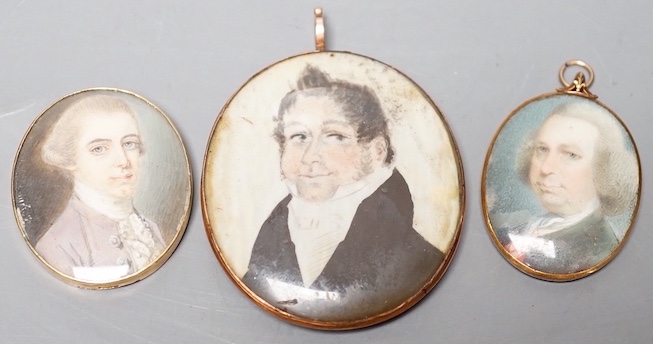 Three Georgian portrait miniatures on ivory of gentlemen, largest 5 cms high, two gold framed